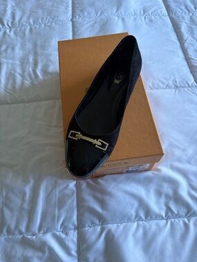 Tod's Black Leather Cap-Toe Ballet Flat with Gold Buckle